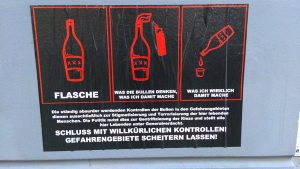 Poster about "dangerous goods" in the Rigaer Str.